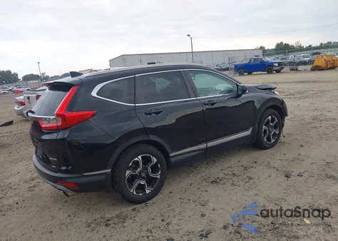 2018 Honda Cr-V Touring z USA, uszkodzony, nr VIN 7FARW1H95JE054478